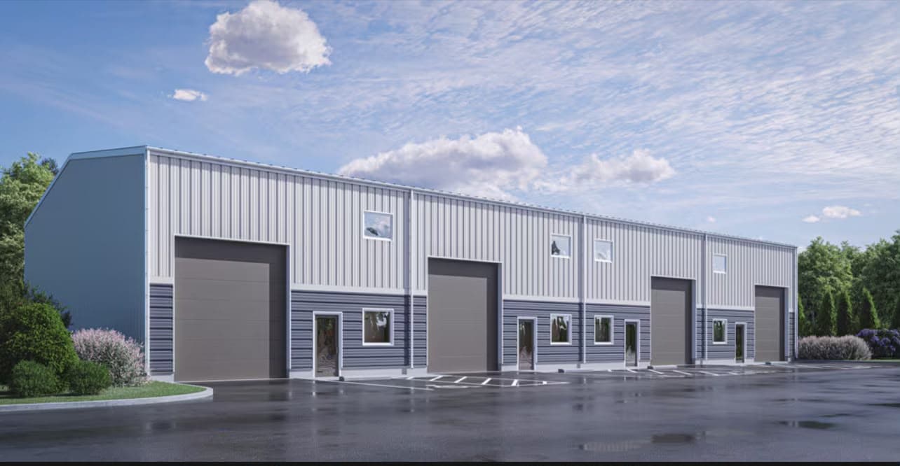 Exterior rendering of a Patriot Park industrial unit building with multiple drive-in loading doors